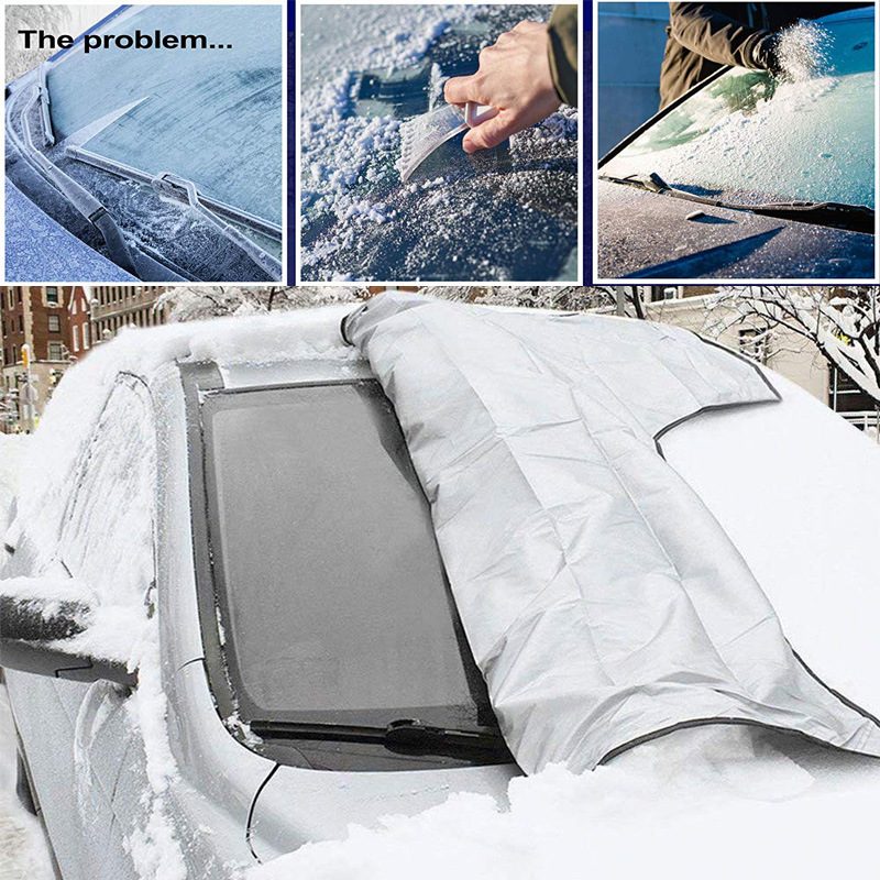 Magnetic snow cover pulled back from a snowy windshield, leaving clear glass underneath
